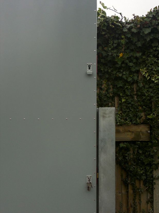 a door with a lock and keys on it