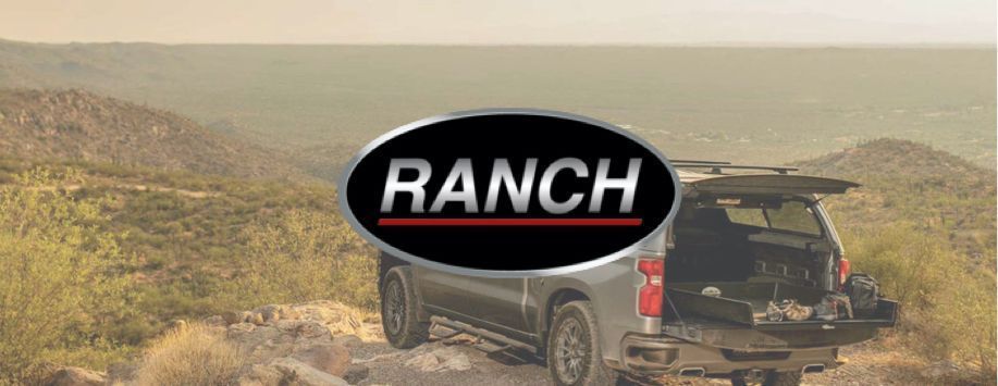 RANCH logo over a pickup truck with the bed open, on a dirt road in a desert landscape.