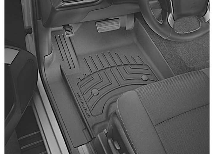Black and white interior car shot with WeatherTech floor mat.