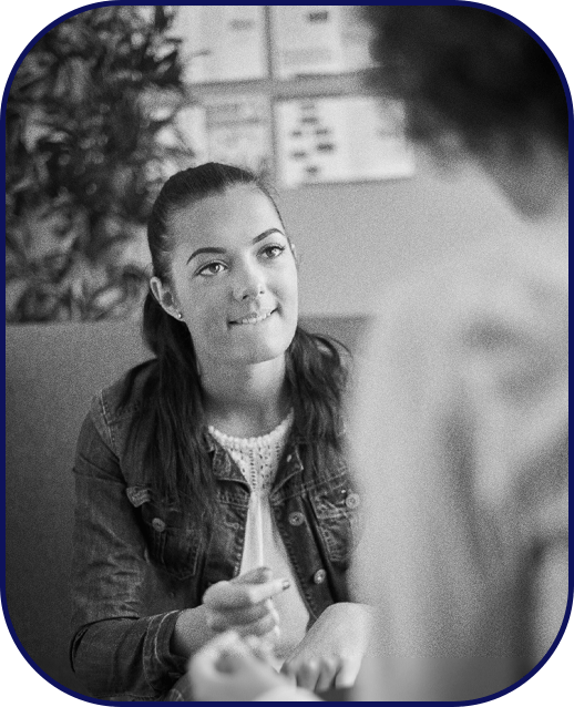 A young woman speaking openly with her therapist