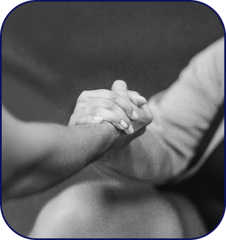 Hands holding for comfort