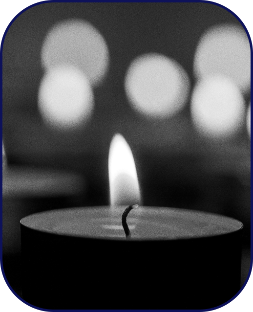 Lit candle to honor the memory of a loved one