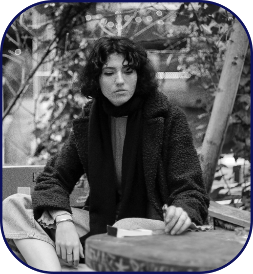 Unhappy woman sitting alone outdoors