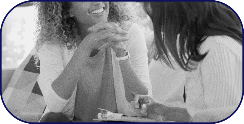 Woman of color leading a therapy session