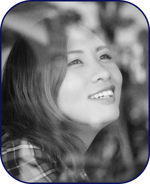 Woman smiling while looking out the window