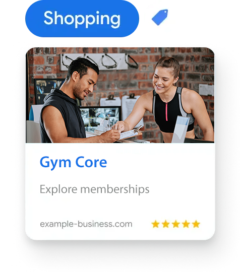 A man and a woman are sitting at a table in a gym.