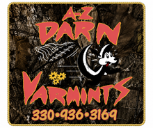 A-Z Darn Varmints sign with raccoon logo and phone number 330-936-3169