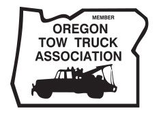 Member Oregon Tow Truck Association sign with black tow truck silhouette on white background