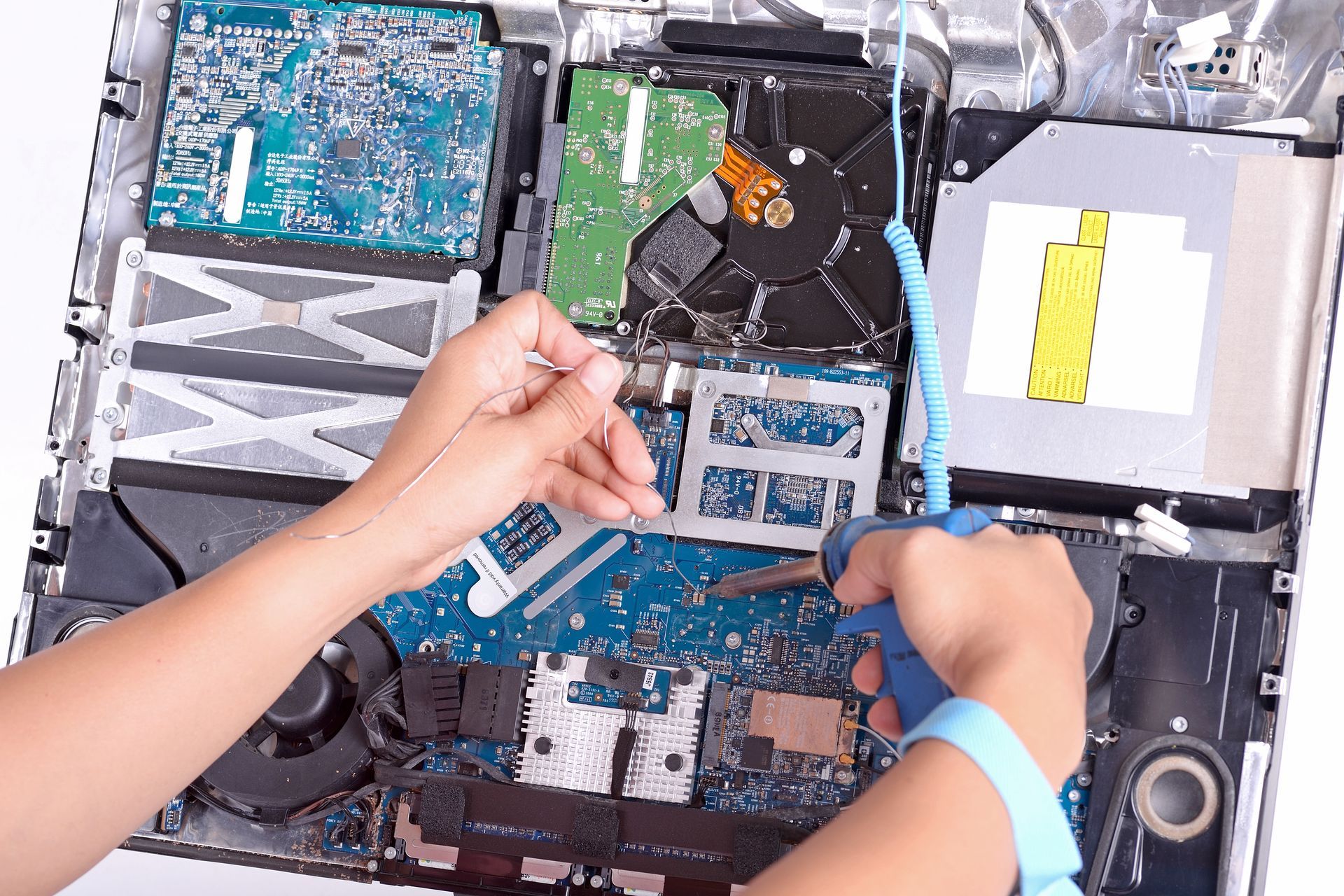 A Laptop With A Galaxy On The Screen Next To A Motherboard A Laptop With A Galaxy On The Screen Next To A Motherboard