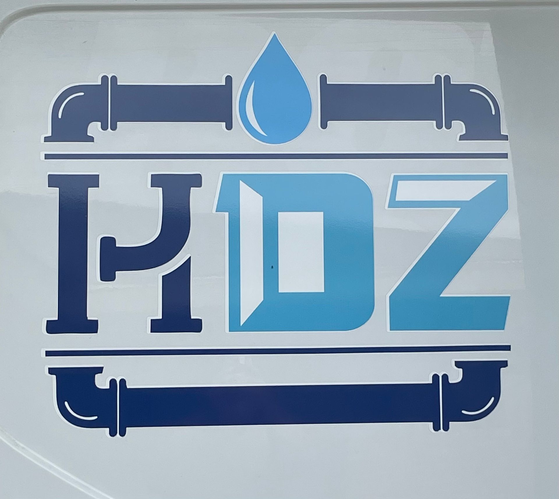 A blue and white logo for hoz with pipes and a drop of water