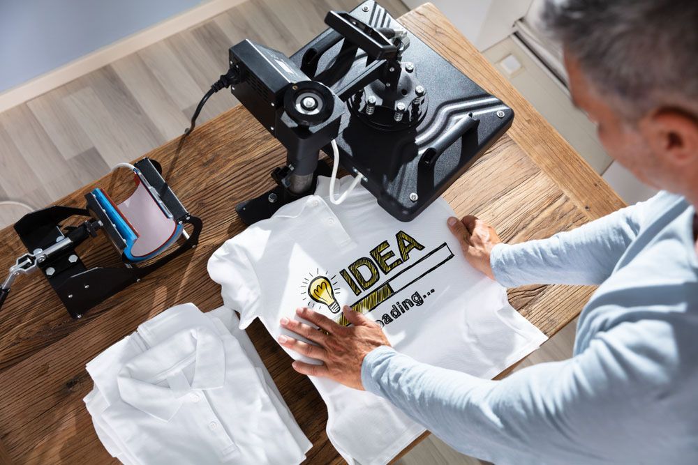 Man Printing Idea on Shirt — Uniforms2U in Leumeah, NSW