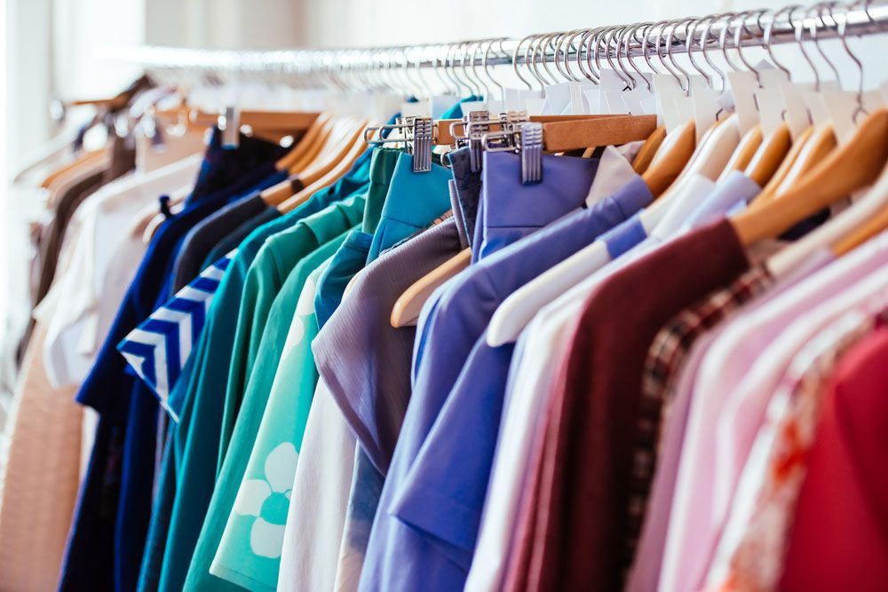 Row of Clothes Hanging on a Rack — Uniforms2U in Leumeah, NSW