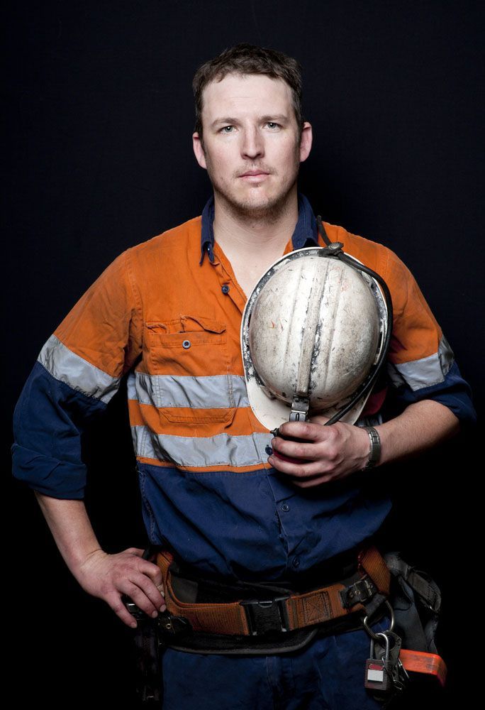 Man Wearing Orange and Blue Shirt — Uniforms2U in Leumeah, NSW