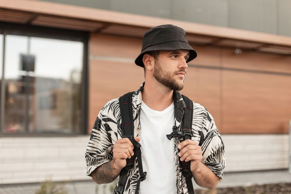 Man Wearing a Bucket Hat and a Backpack — Uniforms2U in Campbelltown, NSW