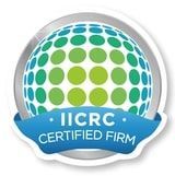 IICRC Certified Firm seal featuring a globe with green and blue circles, and a blue ribbon with white text.
