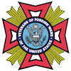 FBI badge emblem with a gold starburst, red border, and blue center seal reading “Department of Justice”