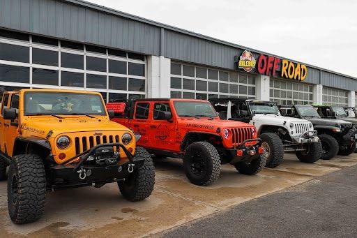 Jeeps parked outside an