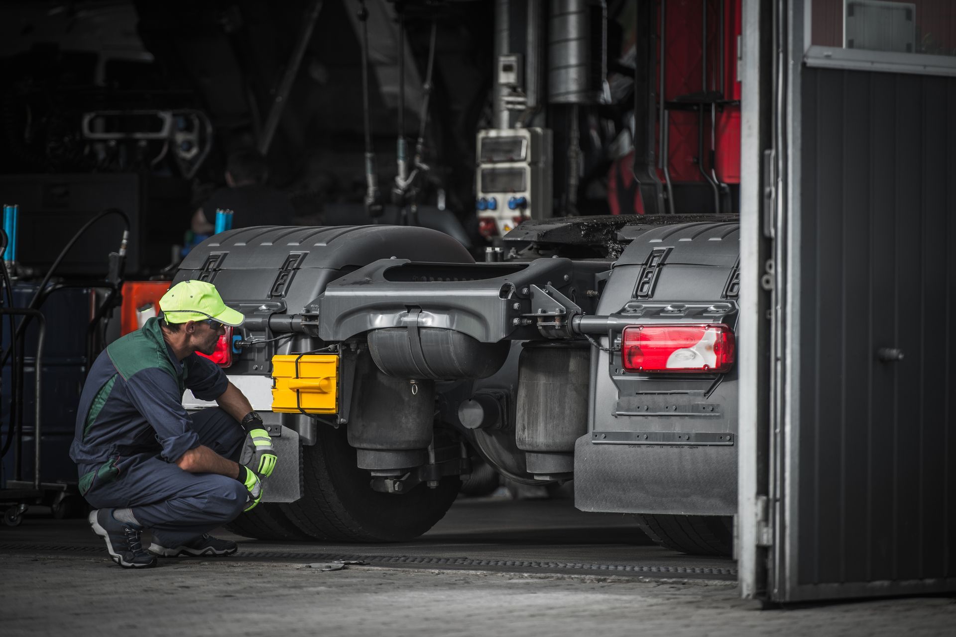 Mechanic of M R W Inc. Truck Repair performing truck maintenance in West Chicago, IL