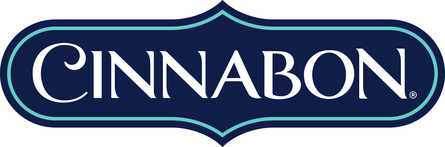A blue sign with the word cinnabon on it.