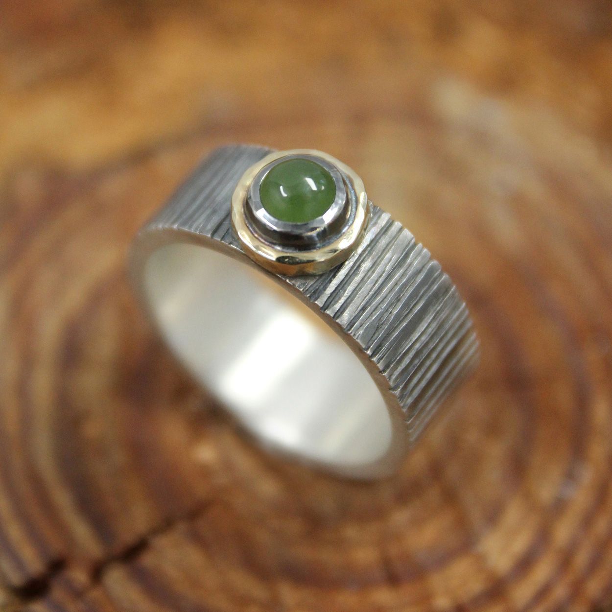Zilveren ring met goud en Jade