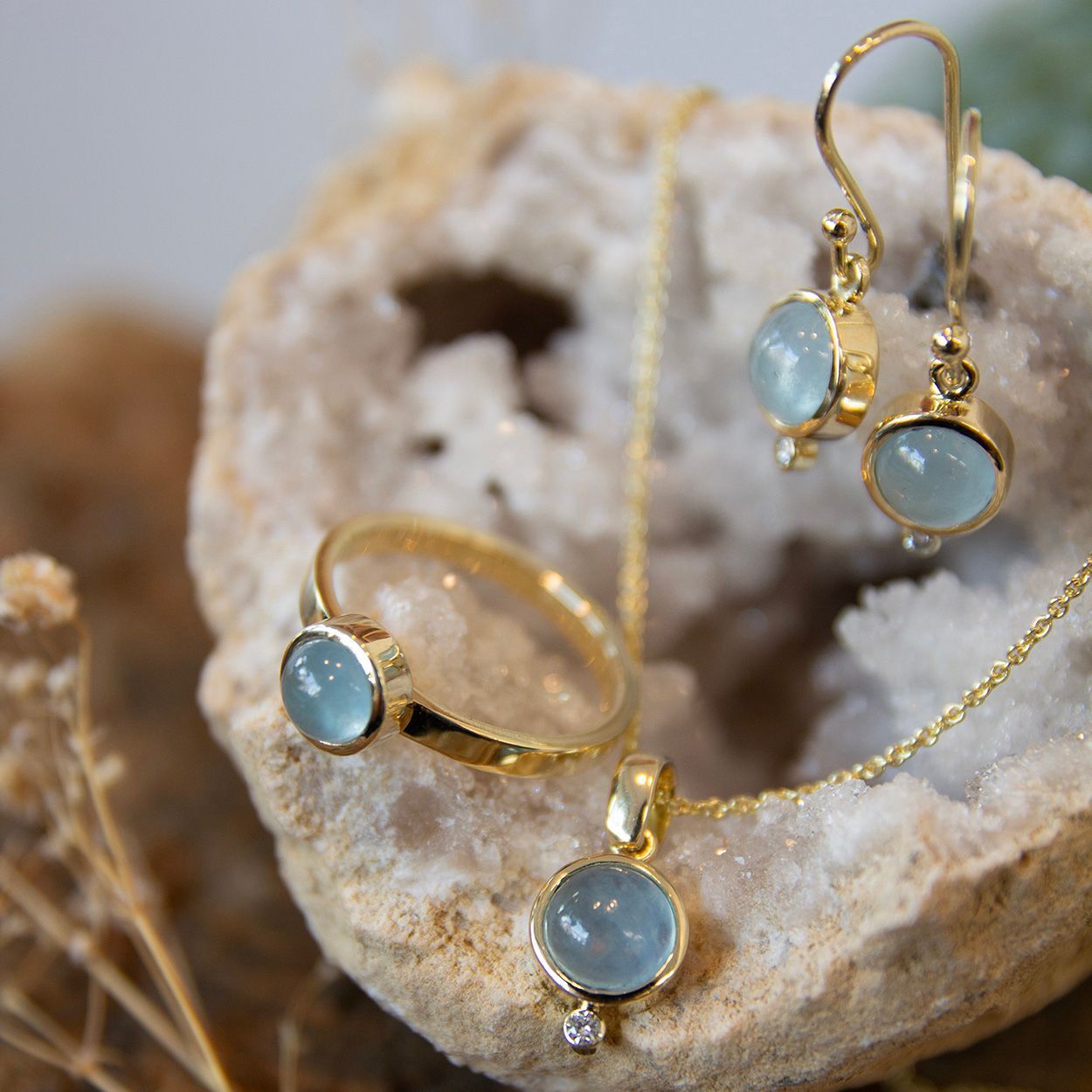 Gouden set aquamarijn diamant