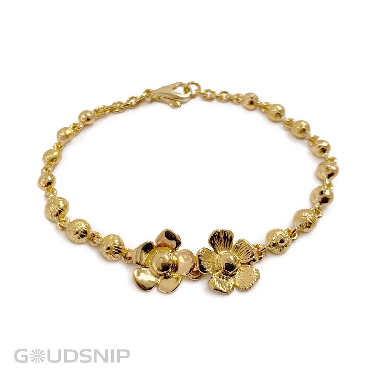 Gouden armband. Elke schakel stelt een familielid voor