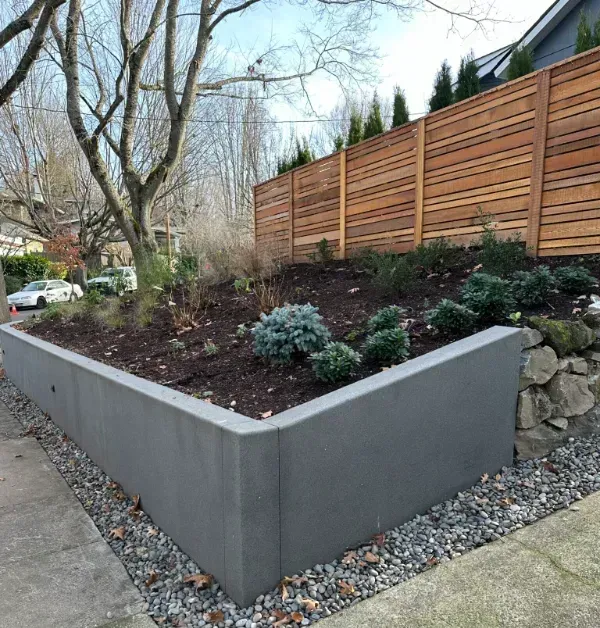 A large house with a patio and stairs in front of it in Portland OR