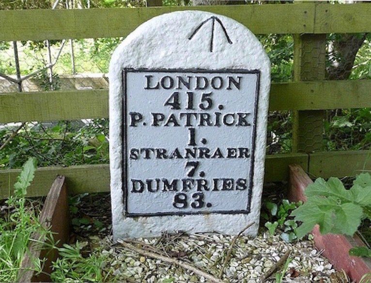 An old milepost sign at Portpatrick, Dumfries and Galloway, Scotland