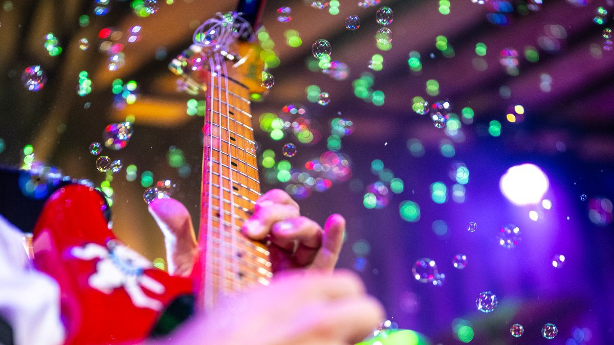 Live guitar performance lighting at Sugarshack Downtown