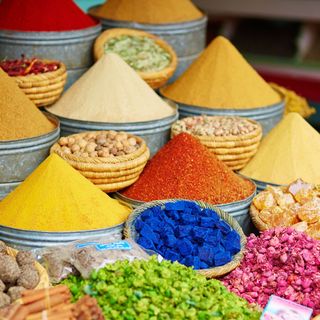 The colorful chaos of a Moroccan market, showcasing the exciting experiences on offer.