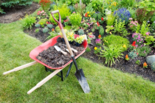 Landscaping a flower bed in front yard in Cheyenne.