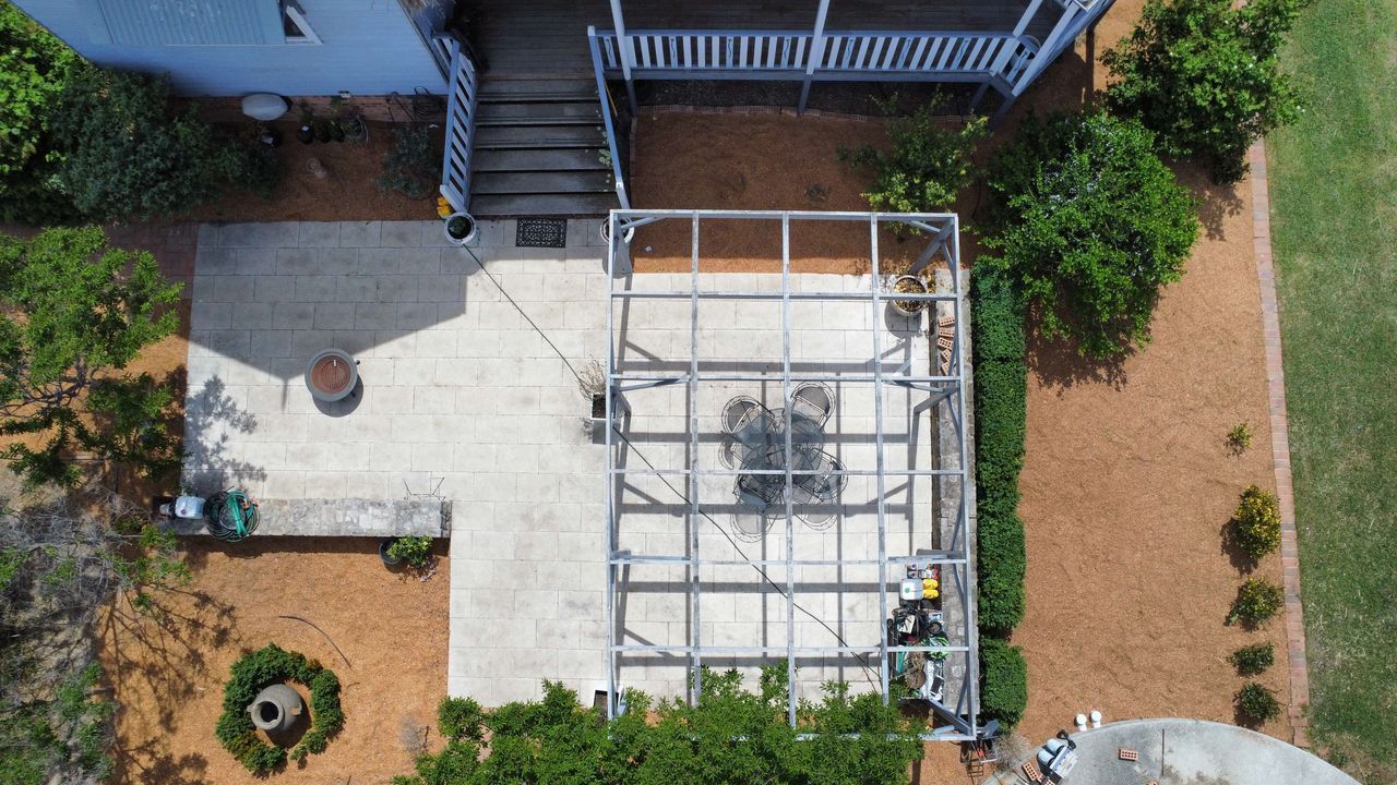 After A Large Lawn With Trees And Bushes In The Background On A Sunny Day — Canberra Home and Garden Maintenance in Tuggeranong ACT