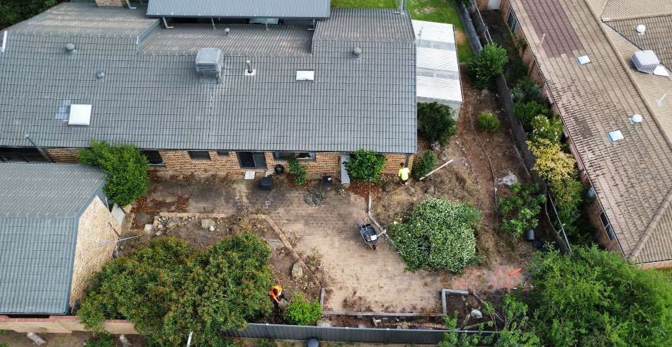 Before An Aerial View Of A House With A Pool In The Backyard — Canberra Home and Garden Maintenance in Tuggeranong ACT