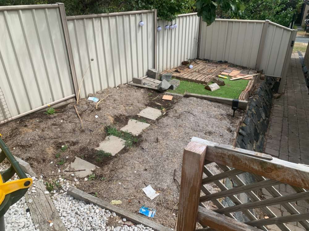 Before A Backyard With A Fence And A Few Steps In The Dirt — Canberra Home and Garden Maintenance in Tuggeranong ACT