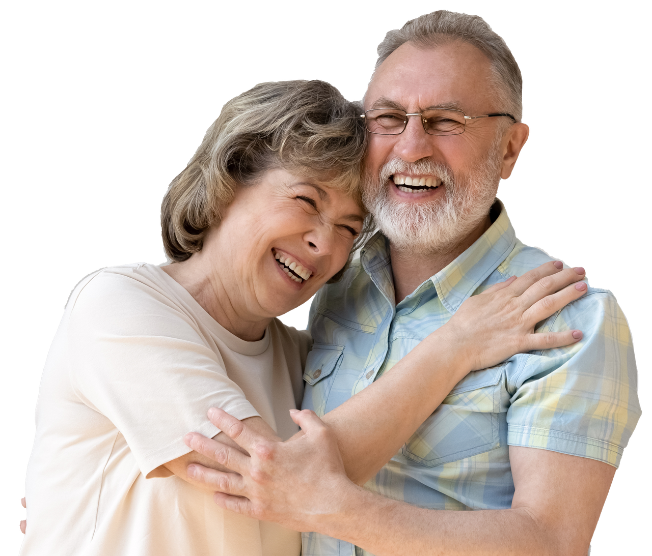 A man and a woman are hugging each other and smiling.