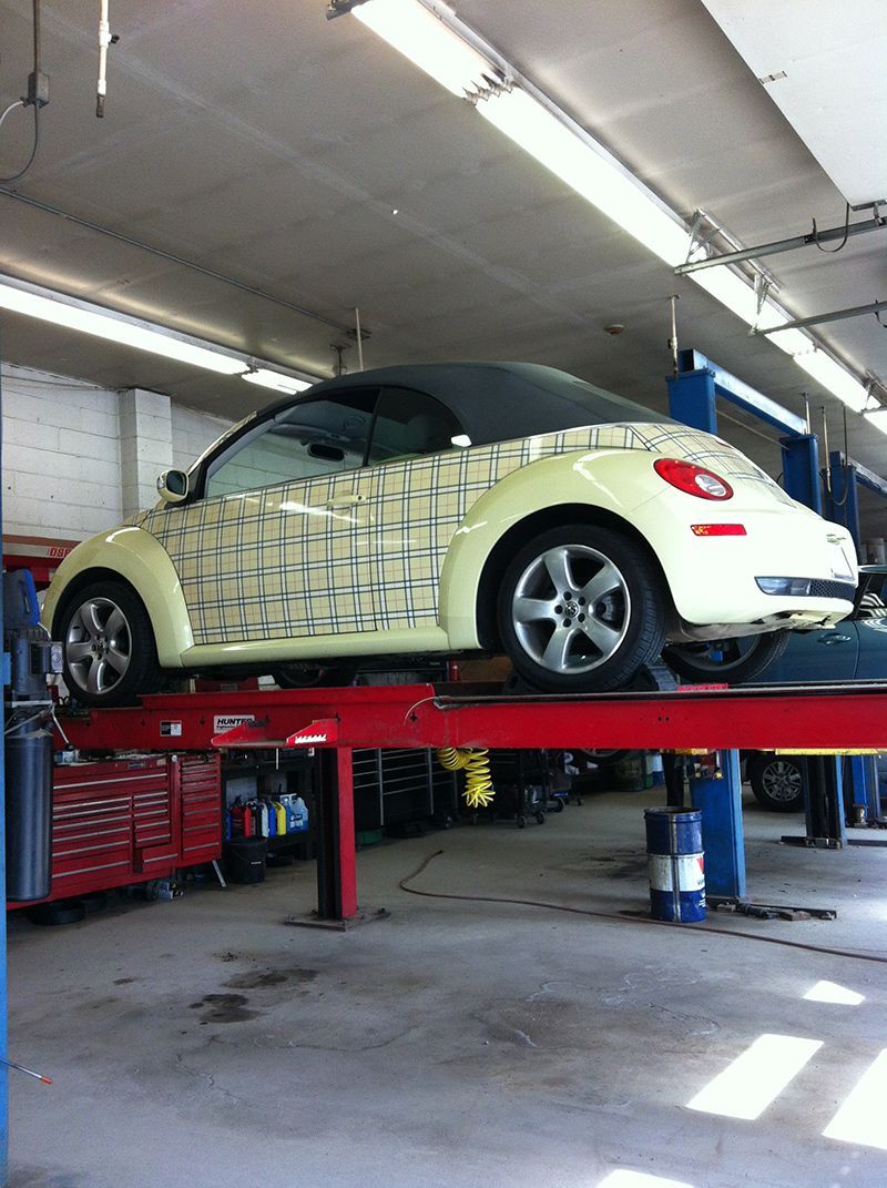 Volkswagen Beetle on a Lift at InTown Auto Care