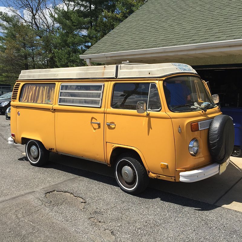 A Yellow Van is Parked in Front of InTown Auto Care