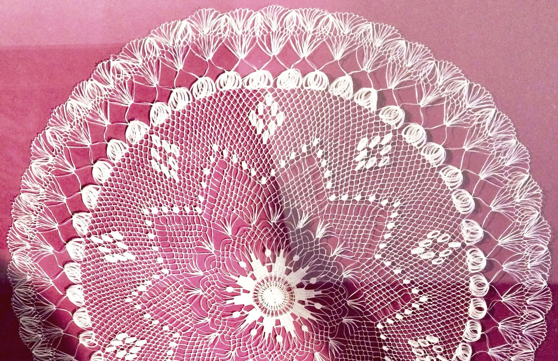 A white lace plate with a star on it