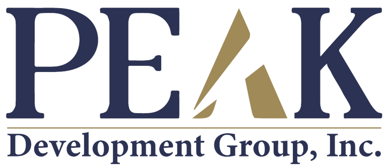 PEAK Development Group, Inc. logo in navy and gold
