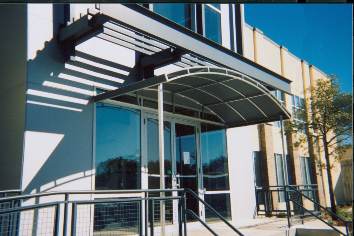 Black Curve Awning Over The Entrance Door - Jacksonville, FL - Boree Canvas Unlimited