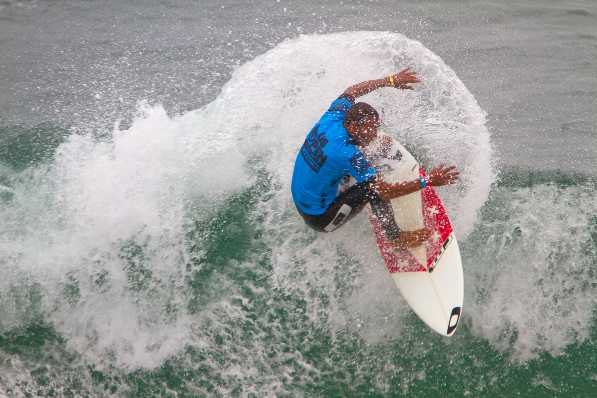 Surfer at the US Open surfing a wave