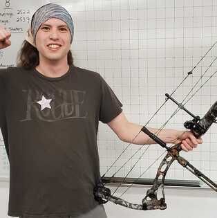 A man with his black bow.