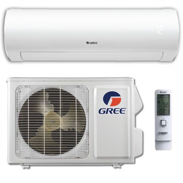 Un climatiseur blanc vert avec télécommande