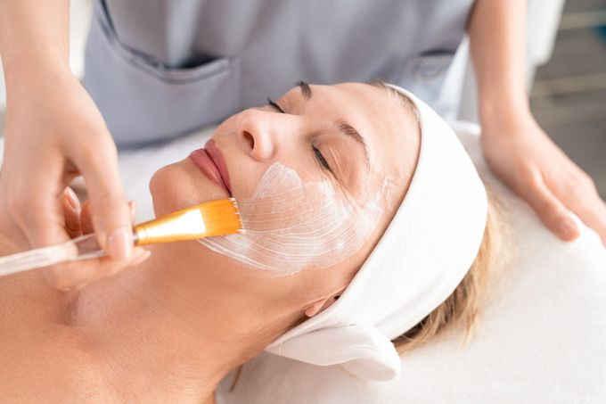 woman receiving a facial treatment