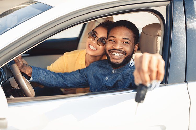 Couple Inside the Car — Slidell, LA — Key Credit Inc.