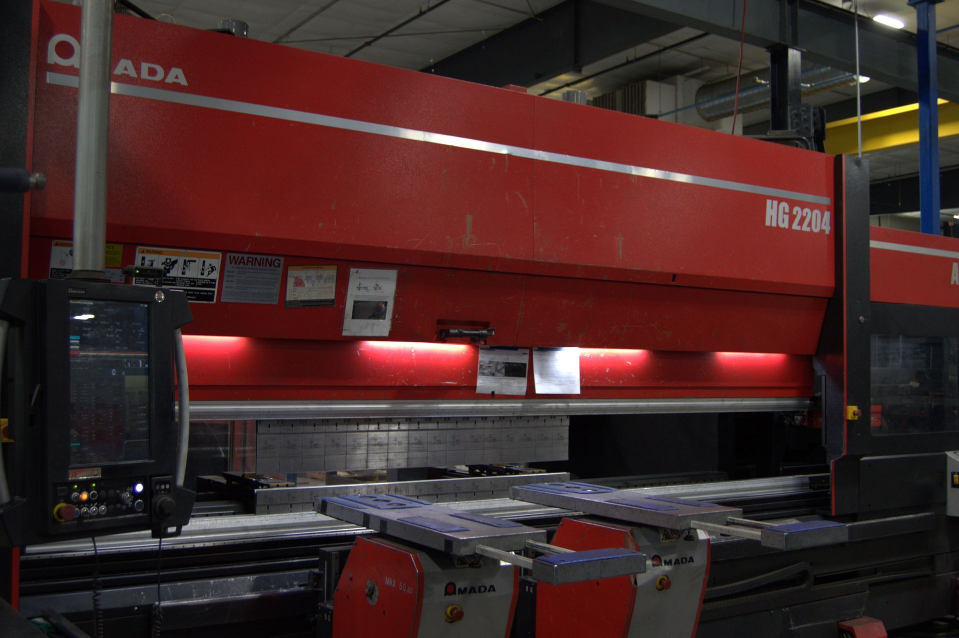 A red laser cutting machine