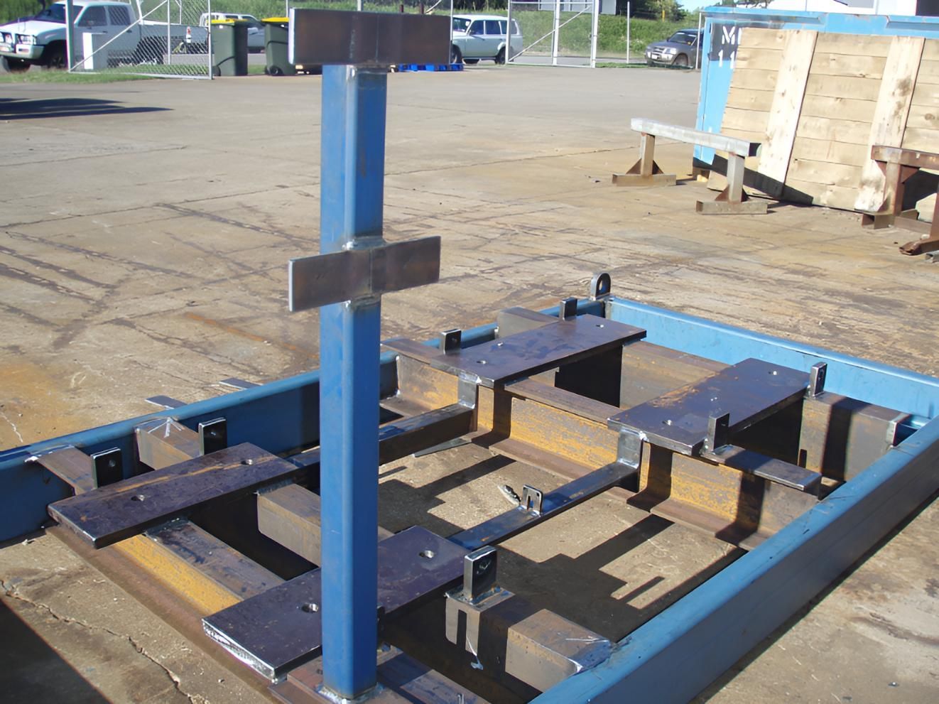 A Blue Metal Structure Is Sitting On The Ground In A Parking Lot — Brian Martin's Sheet Metal In North Mackay, QLD