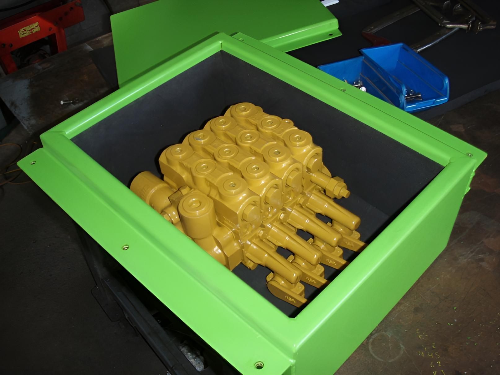 A Green Box With A Bunch Of Yellow Valves Inside Of It — Brian Martin's Sheet Metal In Moranbah, QLD