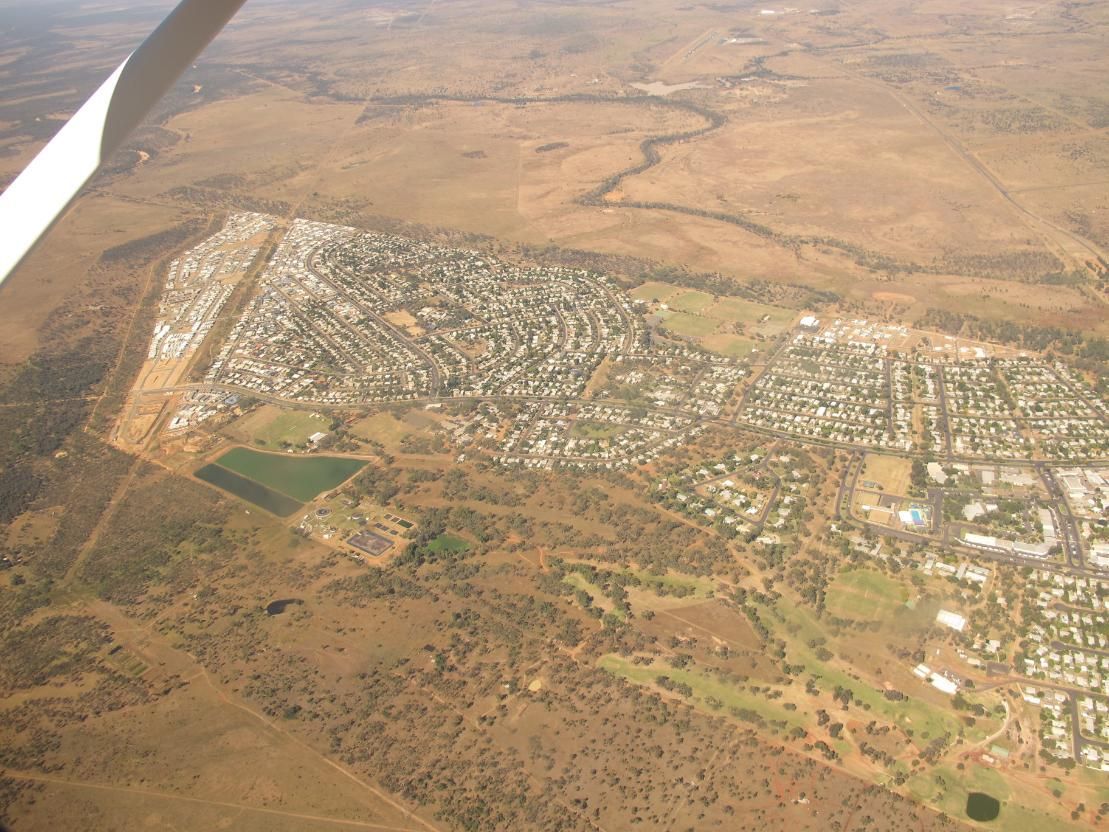 An Aerial View Of A Small Town In The Middle Of A Desert — Brian Martin's Sheet Metal In Moranbah, QLD