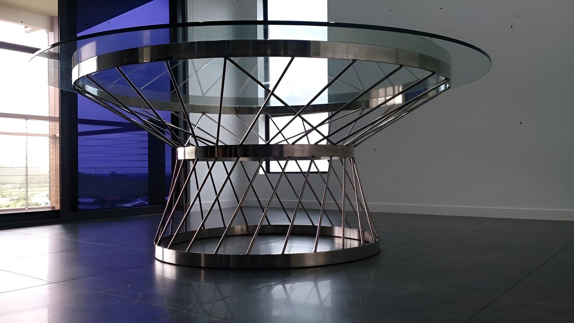 A Round Glass Table With A Metal Base In A Room — Brian Martin's Sheet Metal In Whitsundays, QLD
